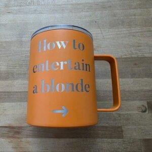 How to Entertain a Blonde Orange Engraved Camper Mug
